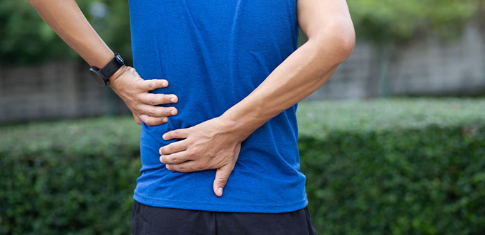 patient suffering from pinched nerve needing a chiropractor in Valley Village