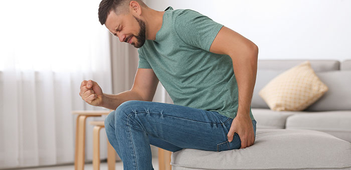 patient suffering from sciatica needing a chiropractor in Valley Village