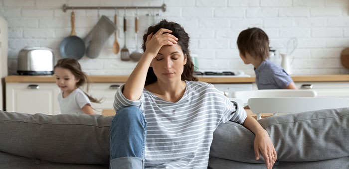 patient suffering from stress needing a chiropractor in Valley Village